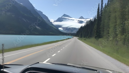 driving along lake roads in glacier photo