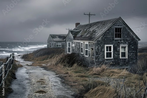 a house by the ocean on a stormy day