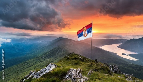 The Flag of Serbia On The Mountain. photo