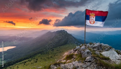 The Flag of Serbia On The Mountain. photo