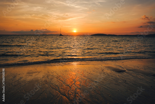 Sunset at Railay Beach with orange lights © artrachen