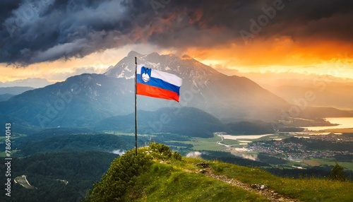 The Flag of Slovenia On The Mountain. photo