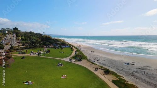 People Relaxing At Powerhouse Park In Del Mar, San Diego, California, United States. Aerial Descending Shot