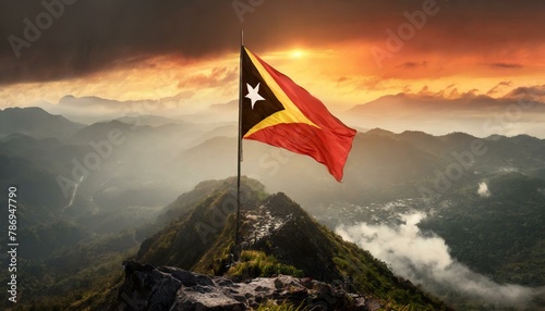 The Flag of Timor Leste On The Mountain. photo