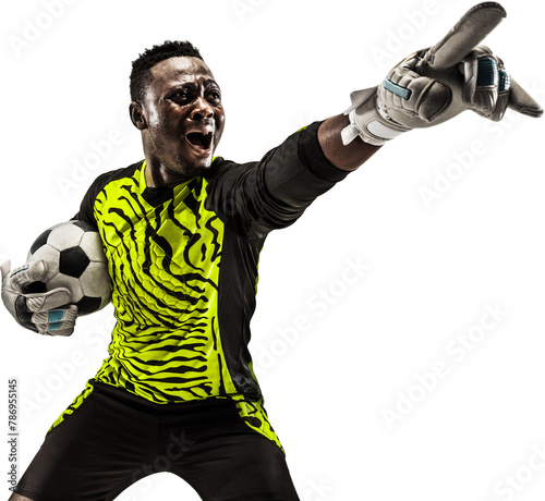 Young African man, football player, goalkeeper pointing away, playing isolated on transparent background. Concept of sport, game, competition, tournament, active lifestyle