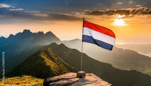 The Flag of Yemen On The Mountain. photo