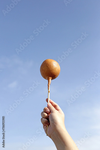 Fried pancake ball with sausage photo