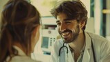 A smiling male doctor in conversation with a female patient, fostering a warm and trusting atmosphere.