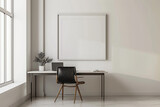 A minimalist office oasis features clean lines and bold accents, with an empty white frame on the wall beckoning for the touch of an artist's hand.