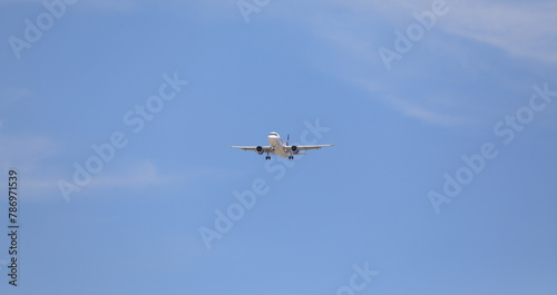 Fototapeta Naklejka Na Ścianę i Meble -  passenger plane in the blue sky