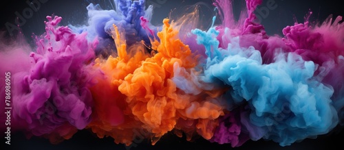 Colorful powder explosion. abstract dust in the background