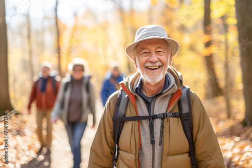 Against the backdrop of vibrant foliage, retired men trek together, their laughter echoing through the serene countryside. photo