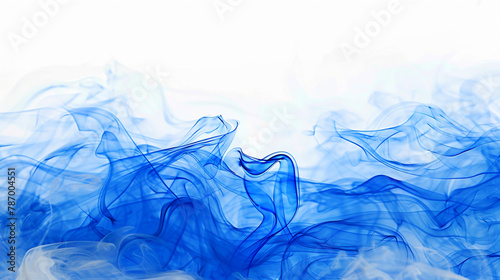 Slow blending of blue paint with water on a white background. Abstract background