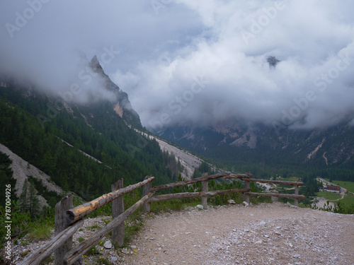 Gravel Path on a Road in the Italian Alps Mountains on a Cloudy Summer day, Italy