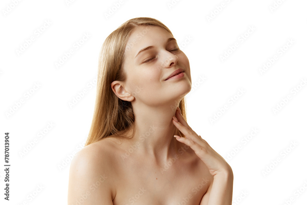 Charming young lady with bare shoulders enjoyed her soft, delicate skin after procedures against white studio background. Concept of natural beauty, organic cosmetic, spa procedures, face-care. Charming young lady with bare shoulders enjoyed her soft, delicate skin after procedures against white studio background. Concept of natural beauty, organic cosmetic, spa procedures, face-care.