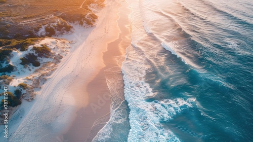 Aerial view of coastline and white sand dunes at sunset. Anna Bay, New South Wales, Australia photo