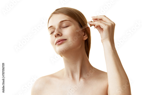 Tableau sur toile Woman using moisturized serum to make her skin firmer and softer against white studio background