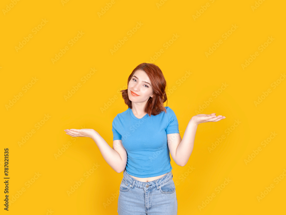 I have no idea, portrait of young caucasian red bob hair woman shrugging shoulders say I have no idea. Confused girl don't know answer. Standing over yellow studio background, isolated, copy space. I have no idea, portrait of young caucasian red bob hair woman shrugging shoulders say I have no idea. Confused girl don't know answer. Standing over yellow studio background, isolated, copy space.