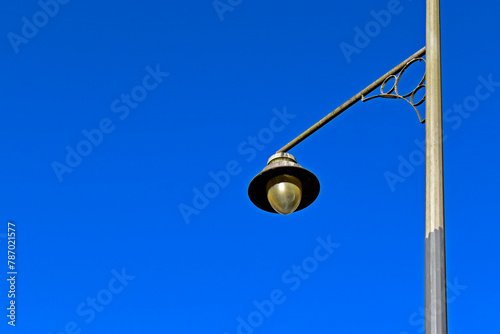 Antique street lamp against a blue sky in Petropolis, Rio de Janeiro, Brazil