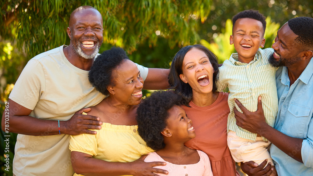Portrait Of Laughing Three Generation Family Outdoors In Summer Countryside Or Garden Portrait Of Laughing Three Generation Family Outdoors In Summer Countryside Or Garden