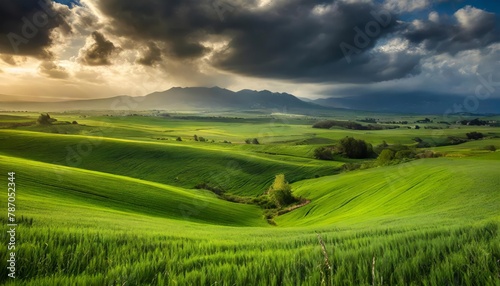 Rolling green hills under stormy skies