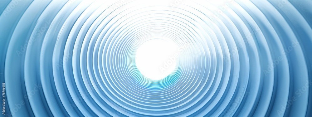 A series of concentric circles in various shades of blue, gradually ...