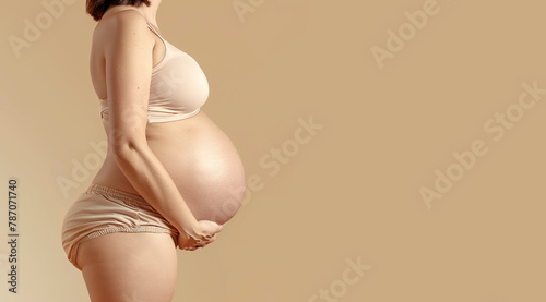 Expecting mother, woman's pregnant belly