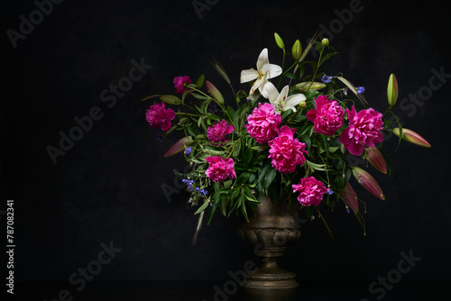 Bouquet of flowers in full bloom  dark background  space for text
