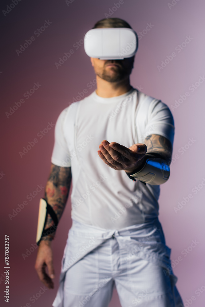 A man wearing a blindfold holds a virtual book, symbolizing a connection between the unknown and the pursuit of knowledge. A man wearing a blindfold holds a virtual book, symbolizing a connection between the unknown and the pursuit of knowledge.