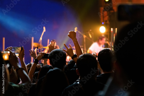 People raises fist at the concert