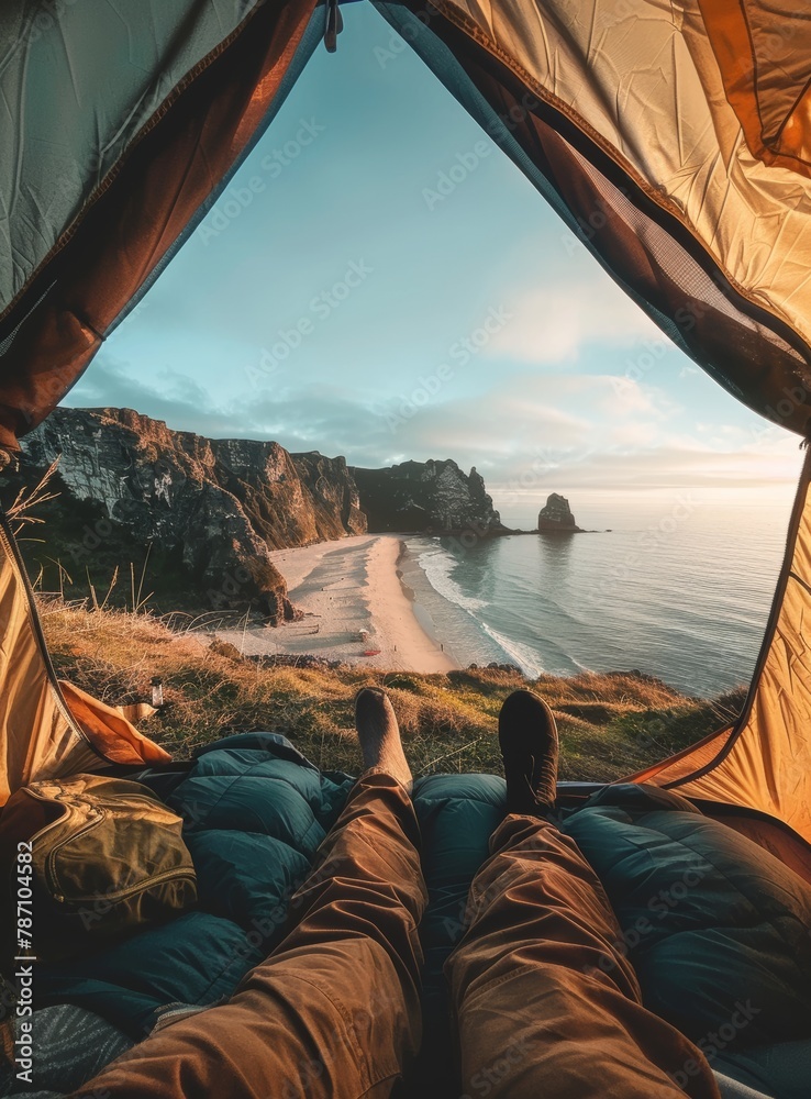 Person Laying in Tent Looking Out at Ocean