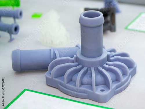 3D printed object from resin polymerization. Parts created on 3D printer from hardened resin. Details printed on 3D printer using SLA printing technology. New modern additive 3D printing technologies