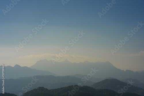 nature traveling with sky and layer of mountain with sunrise background