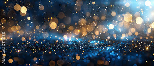 background of sparkling blue and gold bokeh lights, conjuring a sense of magic, festive joy, and the glamorous shimmer of celebratory occasions photo