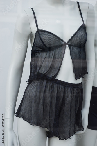 closeup of black transparent underwear on mannequin in a fashion store showroom