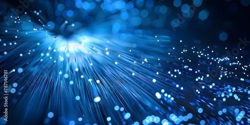  fiber optic light strands in blue light background. network connection concept