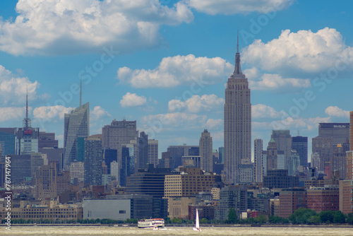 New York City skyline. Manhattan view from Hudson river showing the Empire State Building. 