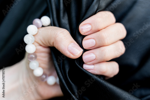 Obraz na płótnie Maintained female nails. Beautiful and natural manicure. Gel polish. Cleaned, shaped and varnished nails. Nail care. w salonie
