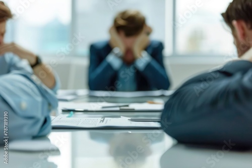 Close-up of a team member nodding in agreement during a productive meeting. photo