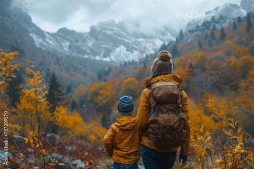 Intimate shot of a mother and child walking away through an autumn forest, encapsulating the essence of family and season