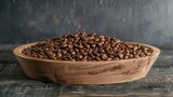 Coffee beans displayed on a wood plate against a dark backdrop