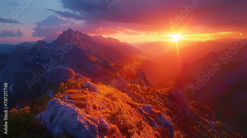 Witness nature's grandeur as the sun sets over majestic mountains. 
