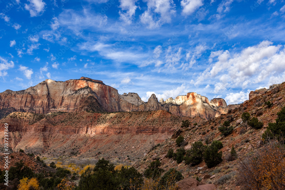 Puffy clouds over rock formations in Zion National Park Puffy clouds over rock formations in Zion National Park