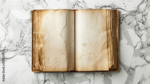 Old opened book with blank pages on white marble background. Top view. Mockup old book