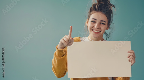 Smiling young woman holding empty signboard with copy space and pointing at her Concept of positive social awareness : Generative AI photo