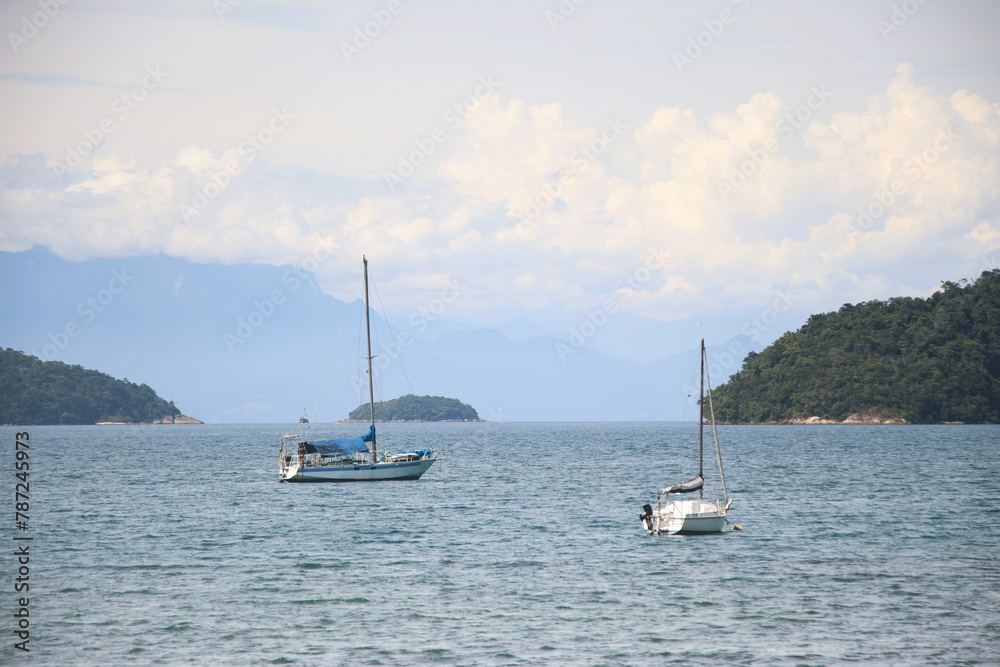 Two Boats on Coastline with Mountain Scene, Ocean Beauty