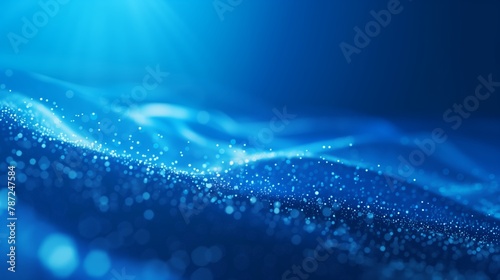 Abstract Glowing Blue Particles and Waves © admin_design