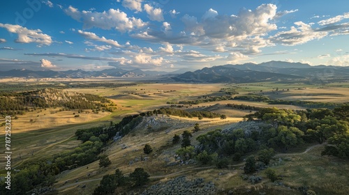 A vast valley with mountains in the background, showcasing the natural landscape and conservation easement