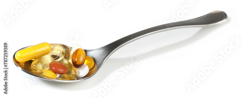 Pills on a spoon on white background - Panorama