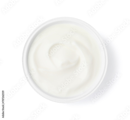 Delicious natural yogurt in plastic cup isolated on white, top view